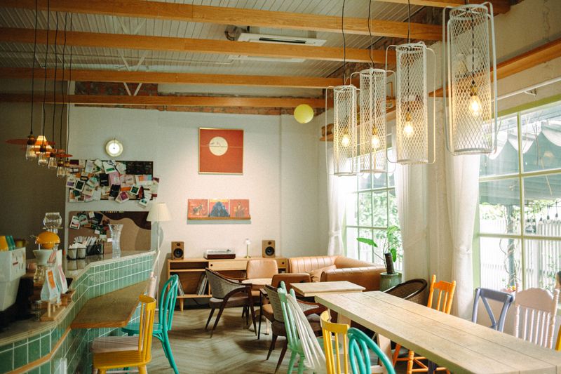 Bright window seating area in Tatte café